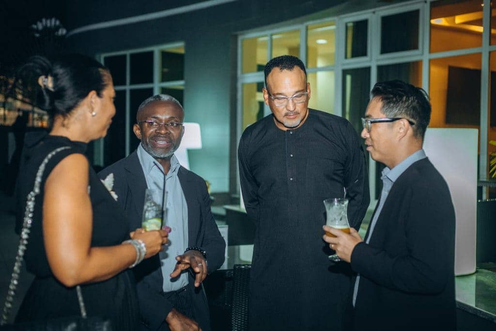 Guests in conversation at a NUTM reception